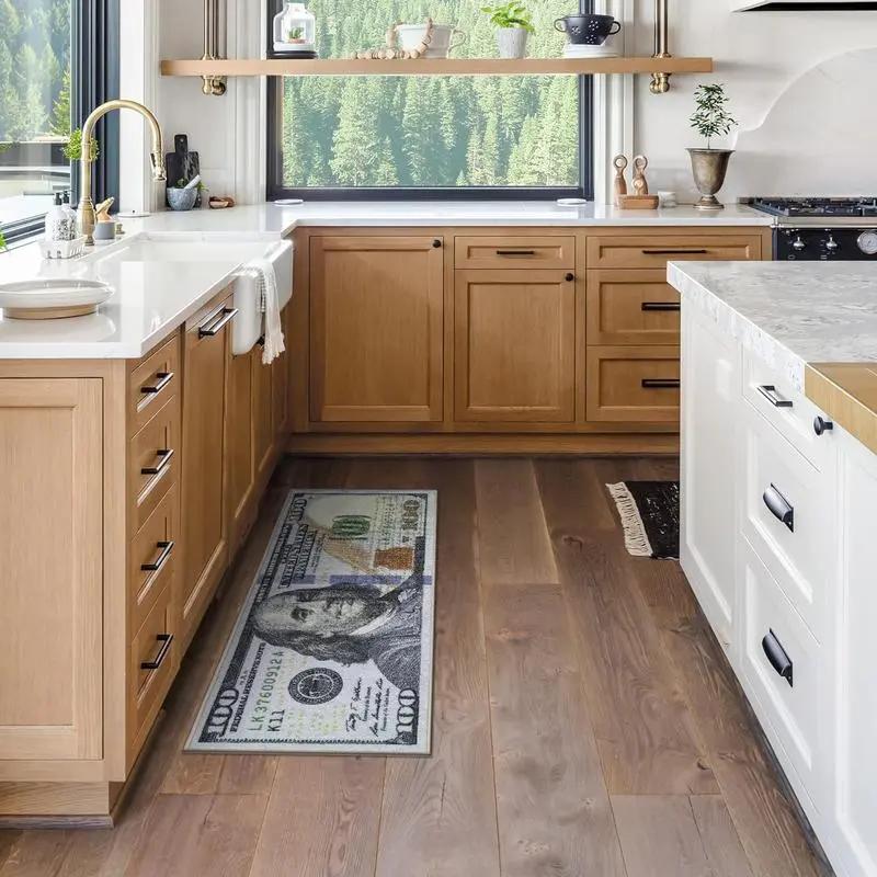 Modern kitchen with wooden cabinets and a decorative rug on the floor.